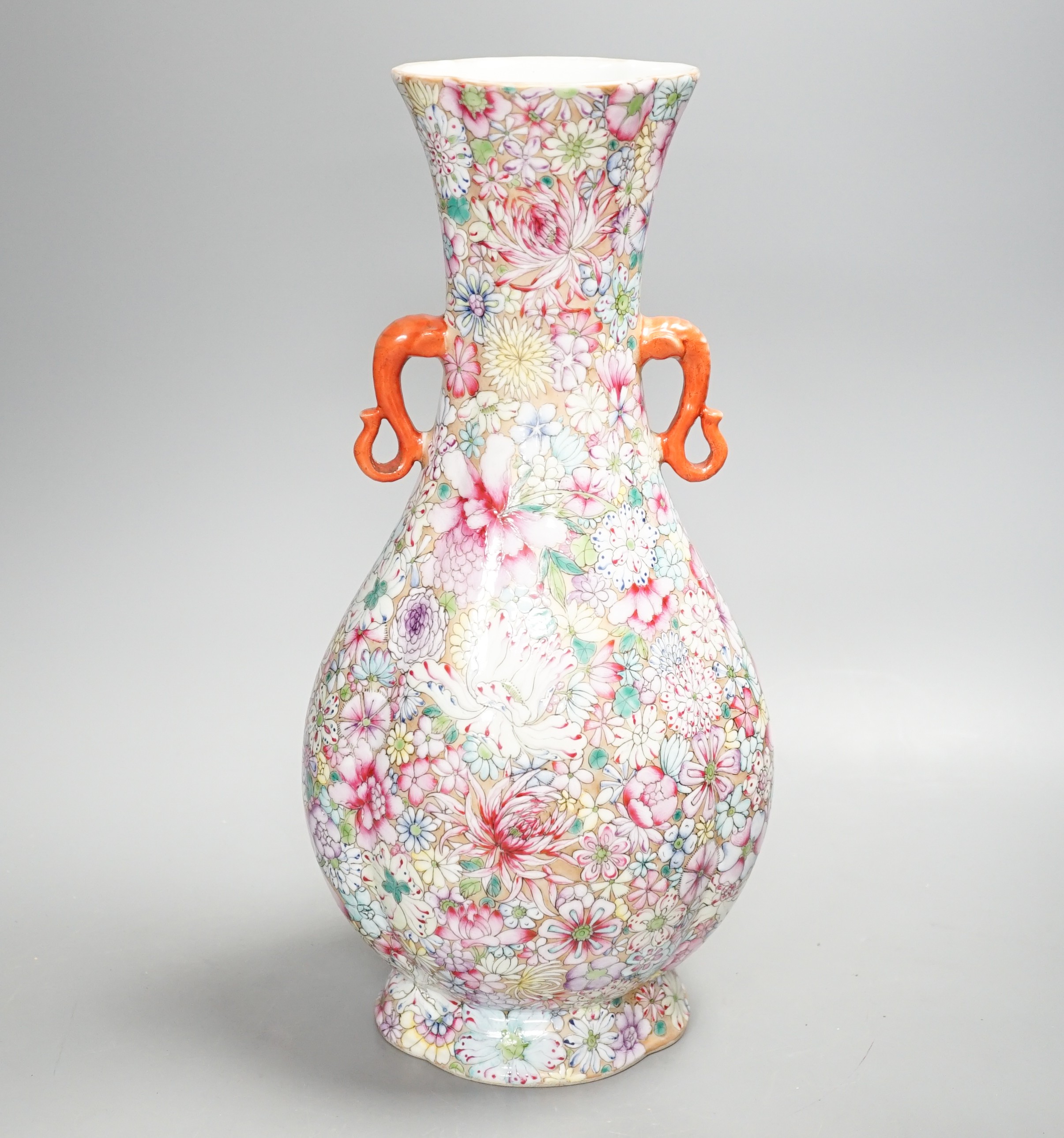 A Chinese famille rose millefleur 2 handled vase, 36cms high.